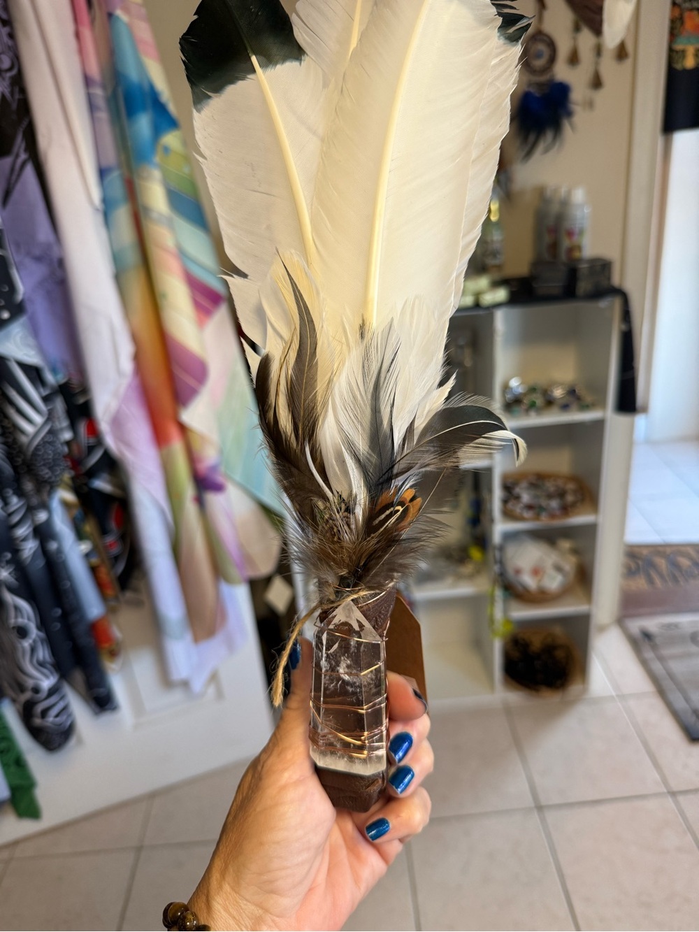 Handheld Feather Smudging Wand in White and Brown with clear quartz crystal
